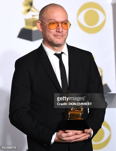 Scott Devendorf of The National, winner of Best Alternative Music Album for 'Sleep Well Beast,' poses in the press room during the 60th Annual Grammy...