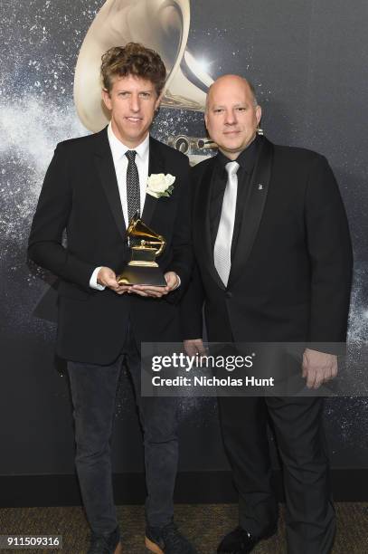 Greg Kurstin, winner of Producer of the Year, Non-Classical, and Chair of the Board for The Recording Academy John Poppo pose backstage at the...