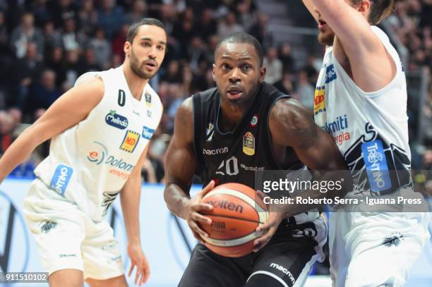 Oliver Lafayette of Segafredo competes with Yannick Franke and Toto Forray of Dolomiti Energia during the LBA Lega Basket of Serie A match between...