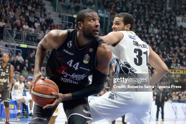 Marcus Slaughter of Segafredo competes with Shavon Shields of Dolomiti Energia during the LBA Lega Basket of Serie A match between Virtus Segafredo...