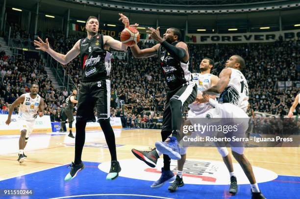 Marcus Slaughter and Filippo Baldi Rossi of Segafredo competes with Dustin Hogue and Shavon Shields and Joao Gomes of Dolomiti Energia during the LBA...