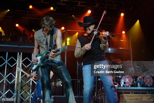 Photo of RASCAL FLATTS and Joe Don ROONEY, Joe Don Rooney performing on stage