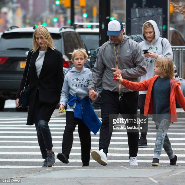 Liev Schreiber seen walking his children Samuel Schreiber and Alexander Schreiber with Taylor Neisen in East Village on January 28, 2018 in New York...