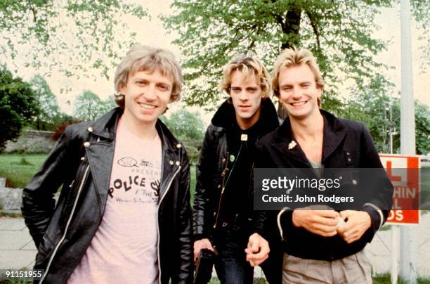 Photo of Andy SUMMERS and Stewart COPELAND and POLICE and STING; L-R: Andy Summers, Stewart Copeland, Sting - posed, group shot