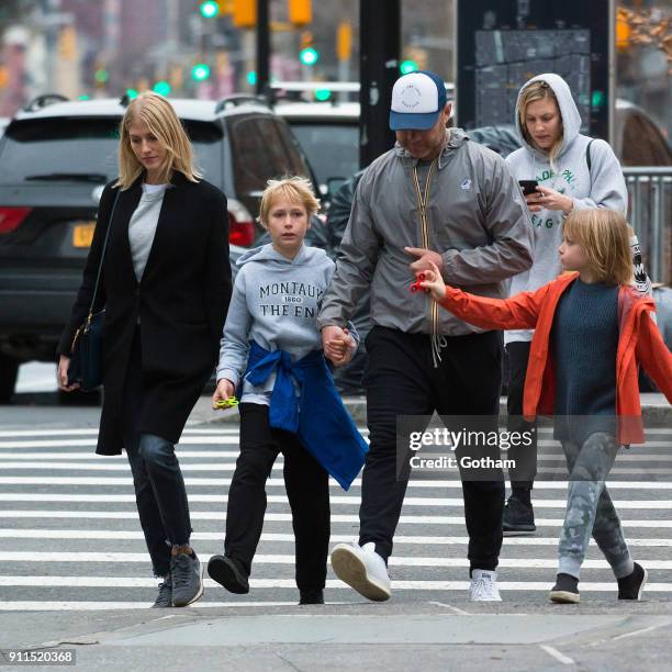 Liev Schreiber seen walking his children Samuel Schreiber and Alexander Schreiber with Taylor Neisen in East Village on January 28, 2018 in New York...