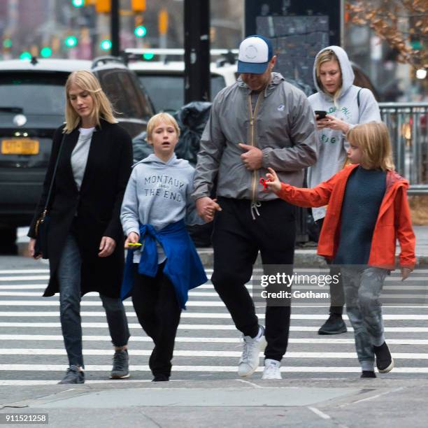 Liev Schreiber seen walking his children Samuel Schreiber and Alexander Schreiber with Taylor Neisen in East Village on January 28, 2018 in New York...