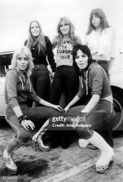 Photo of RUNAWAYS and Lita FORD and Joan JETT and Jackie FOX and Sandy WEST and Cherie CURRIE; Posed group portrait L-R Cherie Currie, Lita Ford,...
