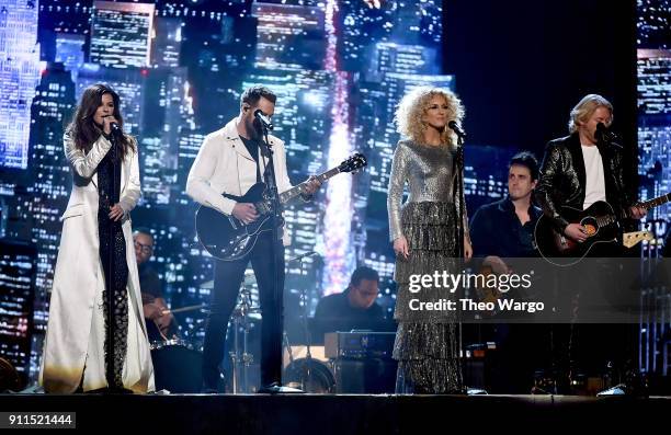 Recording artists Karen Fairchild, Jimi Westbrook, Kimberly Schlapman, and Philip Sweet of musical group Little Big Town perform onstage during the...