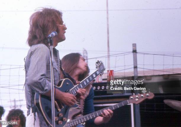 Photo of POCO and Paul COTTON and Timothy B SCHMIT, Paul Cotton and Timothy B Schmit performing on statge at the Nashville Fairgrounds Speedway