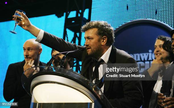 Photo of Craig POTTER and ELBOW and Guy GARVEY and Mark POTTER and Richard JUPP, Group portrait of Elbow on stage accepting the Mercury Music Award...