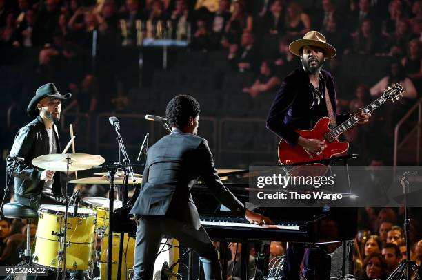 Recording artists Joe Saylor, Jon Batiste, and Gary Clark Jr. Perform onstage during the 60th Annual GRAMMY Awards at Madison Square Garden on...