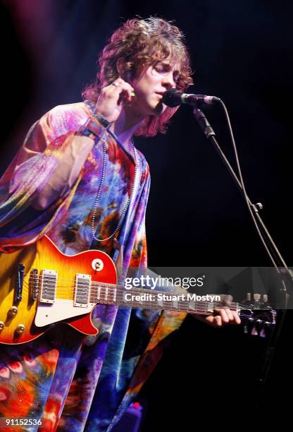 Photo of MGMT and Andrew VanWYNGARDEN, Andrew VanWyngarden performing on stage