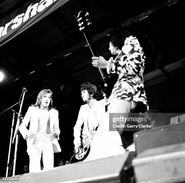Photo of FACES and Rod STEWART and Ron WOOD and Ronnie WOOD and Ronnie LANE, L-R: Rod Stewart, Ronnie Lane, Ron Wood - performing live onstage