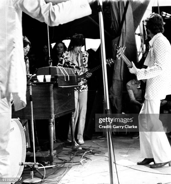 Photo of FACES and Rod STEWART and Ian McLAGAN and Ron WOOD and Ronnie WOOD, L-R: Ian McLagan, Ron Wood , Ronnie Lane - performing live onstage