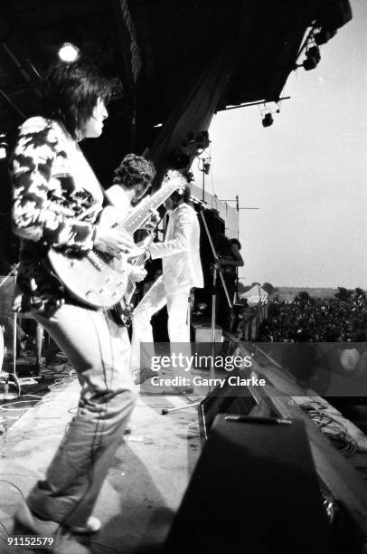 Photo of FACES and Rod STEWART and Ron WOOD and Ronnie WOOD and Ronnie LANE, L-R: Ron Wood , Ronnie Lane, Rod Stewart - performing live onstage