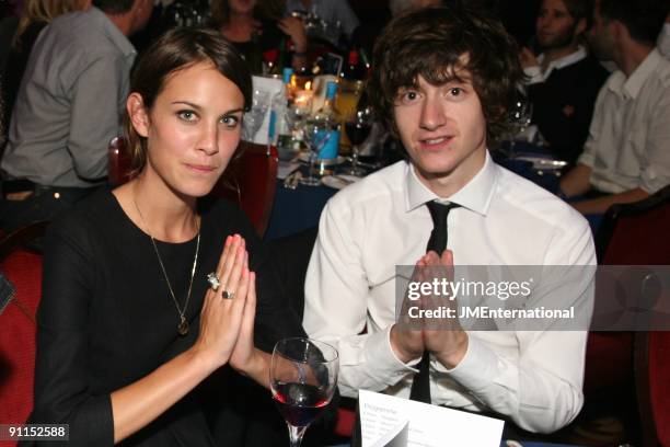 Photo of Alexa CHUNG and Alex TURNER and LAST SHADOW PUPPETS, Alexa Chung and Alex Turner sitting at a table