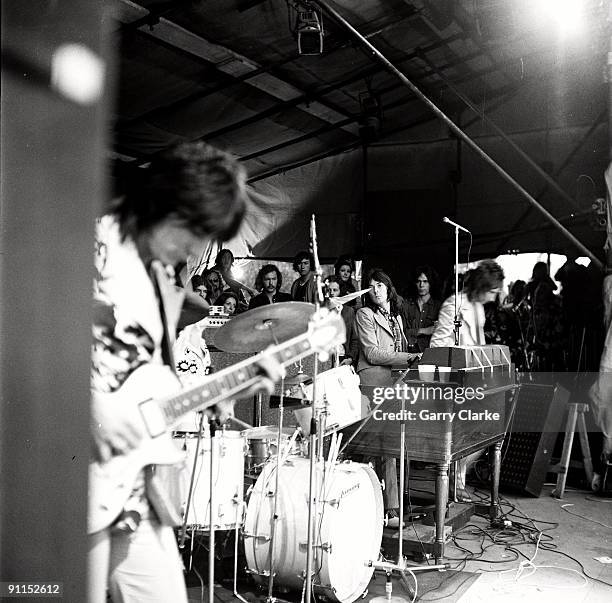 Photo of FACES and Rod STEWART and Ian McLAGAN and Ronnie WOOD and Ron WOOD, L-R: Ron Wood , Ian McLagan, Rod Stewart - performing live onstage