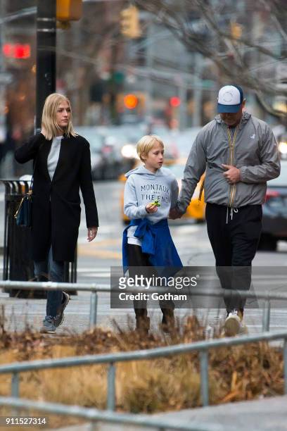 Liev Schreiber seen walking with his son Alexander Schreiber and Taylor Neisen in East Village on January 28, 2018 in New York City.