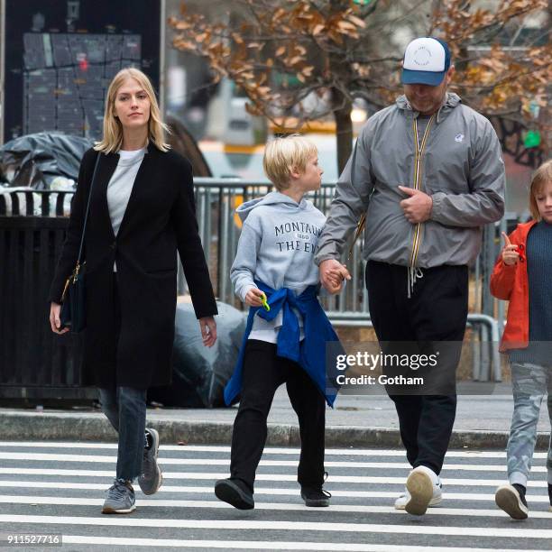 Liev Schreiber seen walking with his son Alexander Schreiber and Taylor Neisen in East Village on January 28, 2018 in New York City.