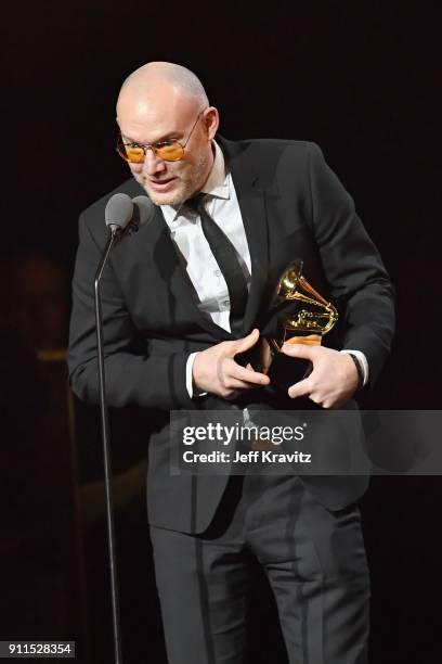 Recording artist Scott Devendorf of The National accepts the award for Best Alternative Music Album onstage at the premiere ceremony during the 60th...