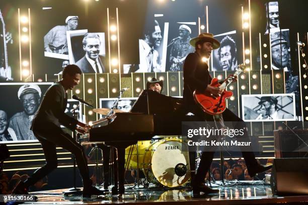 Recording artists Jon Batiste and Gary Clark Jr. Perform onstage during the 60th Annual GRAMMY Awards at Madison Square Garden on January 28, 2018 in...