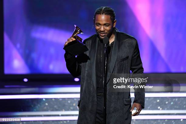 Recording artist Kendrick Lamar accepts Best Rap Album for 'DAMN.' onstage during the 60th Annual GRAMMY Awards at Madison Square Garden on January...