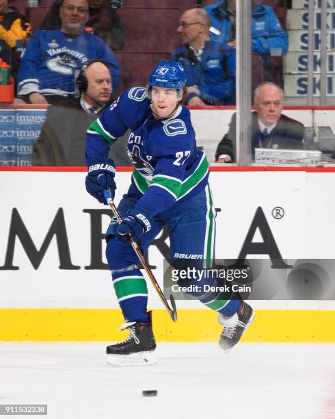 Ben Hutton of the Vancouver Canucks passes the puck during their NHL game against the Buffalo Sabres at Rogers Arena on January 25, 2018 in...
