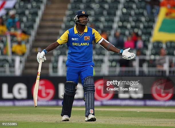 Angelo Matthews of Sri Lanka complains after being obstructed and then run out during the ICC Champions Trophy group B match between Sri Lanka and...