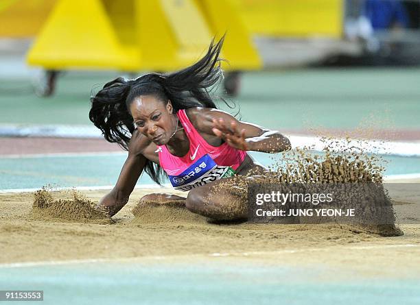 Funmi Jimoh of the US competes during the women's long jump of the Daegu Pre-Championships Meeting in Daegu, south of Seoul, on September 25, 2009....