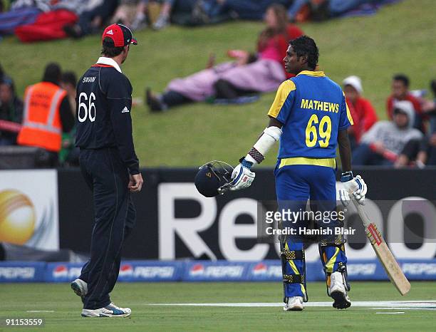 Angelo Mathews of Sri Lanka turns to be recalled on his way from the field after being given run out after a collision with Graeme Onions of England...