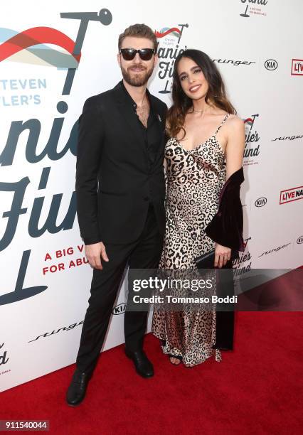 Jon Foster and Chelsea Tyler at Steven Tyler and Live Nation presents Inaugural Janie's Fund Gala & GRAMMY Viewing Party at Red Studios on January...