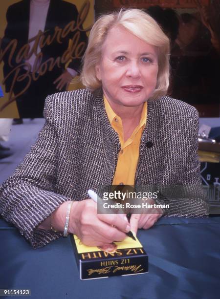 Columnist Liz Smith signs a copy of her latest book at a New York city Barnes & Noble, 2000.