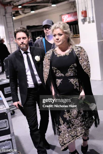 Brandon Blackstock and recording artist Kelly Clarkson pose backstage at the 60th Annual GRAMMY Awards at Madison Square Garden on January 28, 2018...