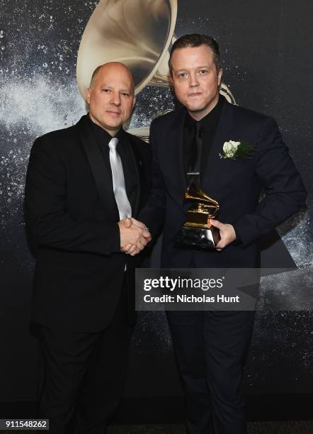 Chair of the Board for The Recording Academy John Poppo and recording artist Jason Isbell, winner of Best Americana Album for 'The Nashville Sound',...