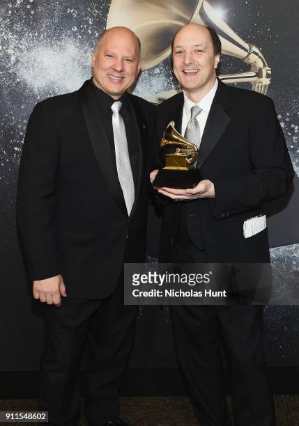Chair of the Board for The Recording Academy John Poppo and Music producer David Frost, winner Producer of the Year, Classical, poses backstage at...