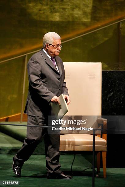 Palestinian President Mahmoud Abbas walks to address the United Nations General Assembly at the UN headquarters on September 25, 2009 in New York...