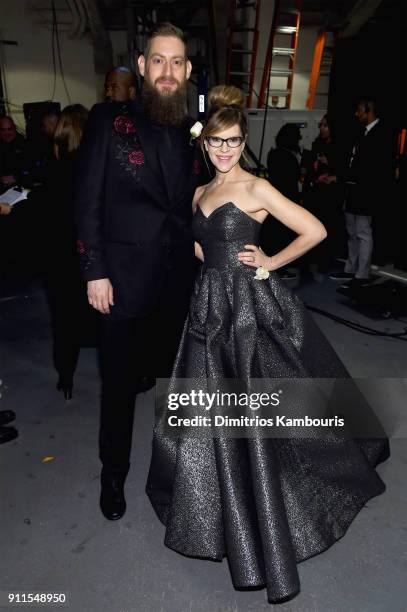 Music supervisor Roey Hershkovitz and recording artist Lisa Loeb pose backstage during the 60th Annual GRAMMY Awards Madison Square Garden on January...