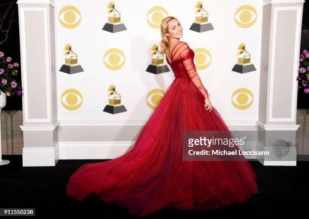 Recording artist Miley Cyrus poses in the press room during the 60th Annual GRAMMY Awards at Madison Square Garden on January 28, 2018 in New York...