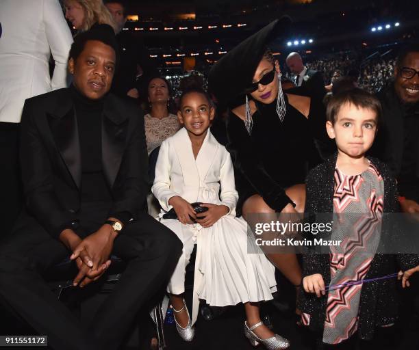 Recording artist Jay Z, daughter Blue Ivy Carter, recording artist Beyonce and a guest attend the 60th Annual GRAMMY Awards at Madison Square Garden...