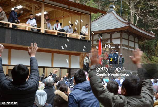 Rice cake throwing event is held at the Kotaki temple in Kawachinagano, Osaka Prefecture, on Jan. 28 to wish for people's health, safety and welfare....