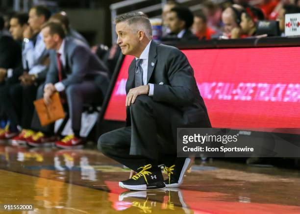 South Florida Bulls head coach Brian Gregory watches a play during the college basketball game between the South Florida Bulls and Houston Cougars on...