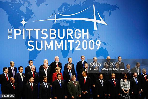 World leaders pose for a group photo at the G-20 economic summit on September 25, 2009 in Pittsburgh, Pennsylvania. Standing in the front row are...