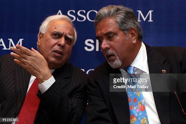 Minister Kapil Sibal and Dr. Vijay Mallya during the event "Partnership between Business and LAW and a function for presentation of ASSOCHAM...