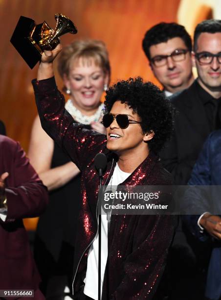 Recording artist Bruno Mars accepts Album of the Year for '24K Magic' with production team onstage during the 60th Annual GRAMMY Awards at Madison...