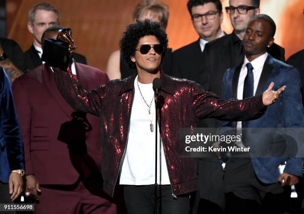 Recording artist Bruno Mars accepts Album of the Year for '24K Magic' with production team onstage during the 60th Annual GRAMMY Awards at Madison...