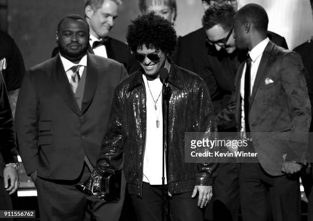 Recording artist Bruno Mars accepts Album of the Year for '24K Magic' with production team onstage during the 60th Annual GRAMMY Awards at Madison...