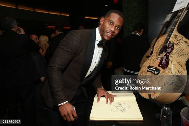 Football player Victor Cruz with the GRAMMY Charities Signings during the 60th Annual GRAMMY Awards at Madison Square Garden on January 28, 2018 in...