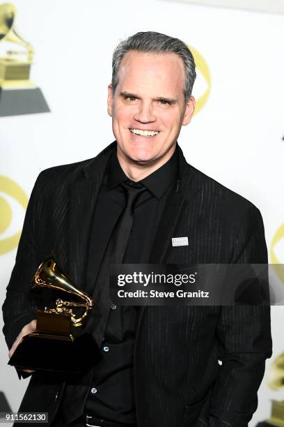 Actor Michael Park, winner of the Best Musical Theater Album award for 'Dear Evan Hansen' poses in the press room during the 60th Annual GRAMMY...