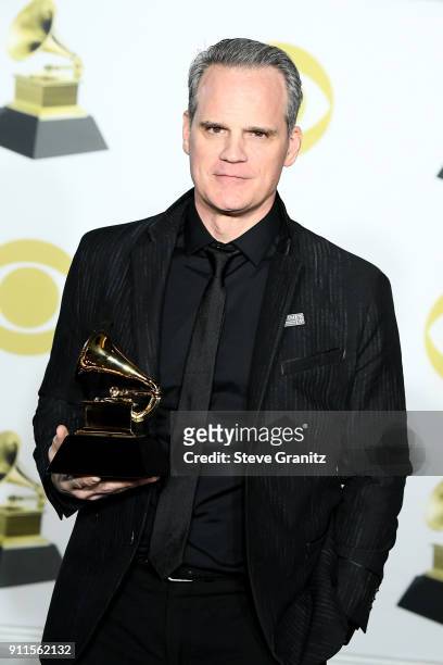 Actor Michael Park, winner of the Best Musical Theater Album award for 'Dear Evan Hansen' poses in the press room during the 60th Annual GRAMMY...