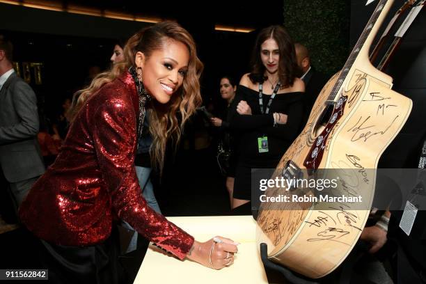 Recording artist Eve with the GRAMMY Charities Signings during the 60th Annual GRAMMY Awards at Madison Square Garden on January 28, 2018 in New York...